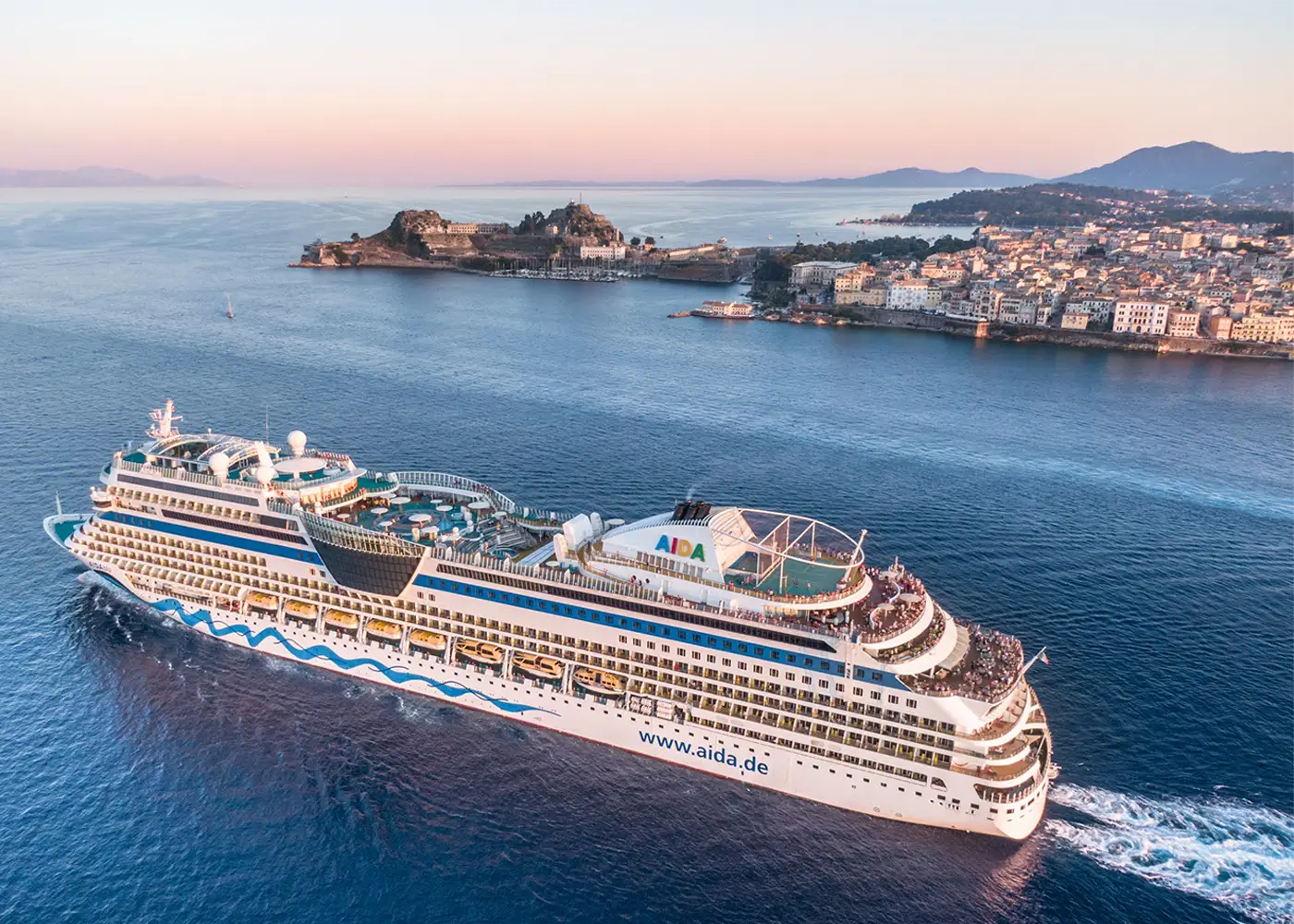 A cruise ship alongside the passenger terminal at the port of Corfu